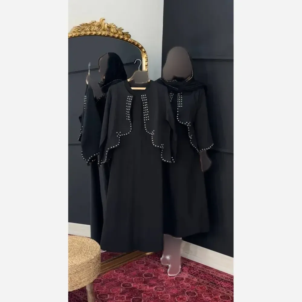 مانتو مدل نجلا جنس ابروبادی مشکی خرج کار طلایی فری سایز 38 تا 50