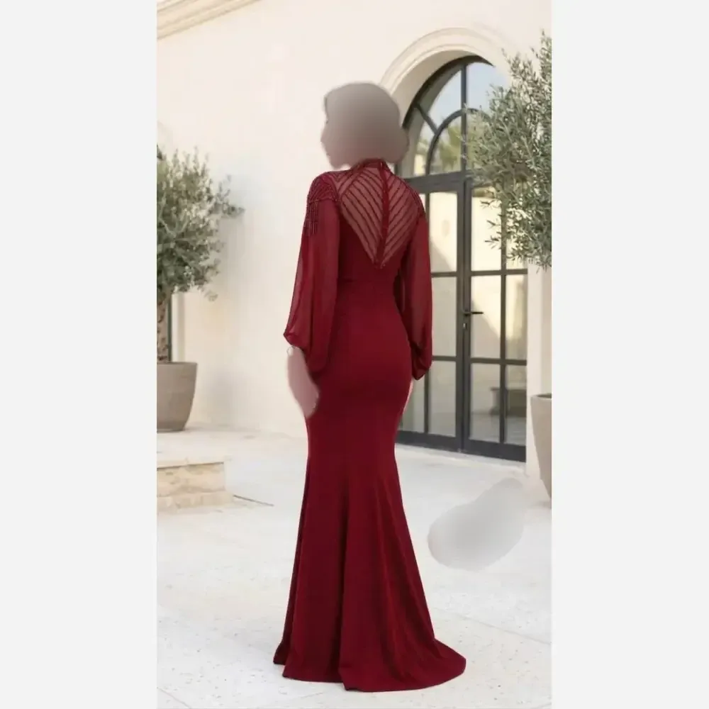 پیراهن ماکسی مجلسی زنانه کرپ دالقیچ سنگدوزی شده با کاپ سینه رنگ مشکی