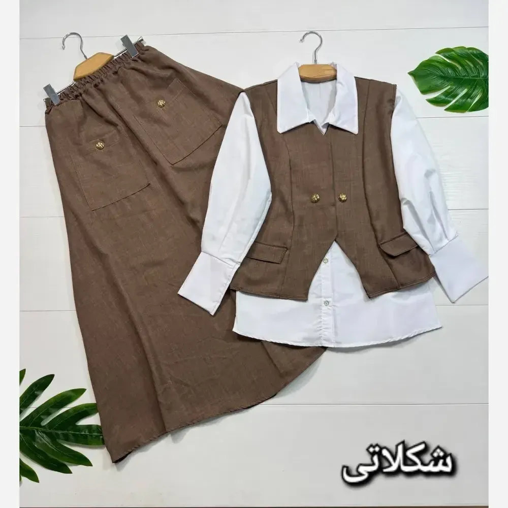 ست سه تیکه زنانه مدل مرسده شامل جلیقه و دامن شانتون و شومیز داکرون فری سایز 38 تا 46