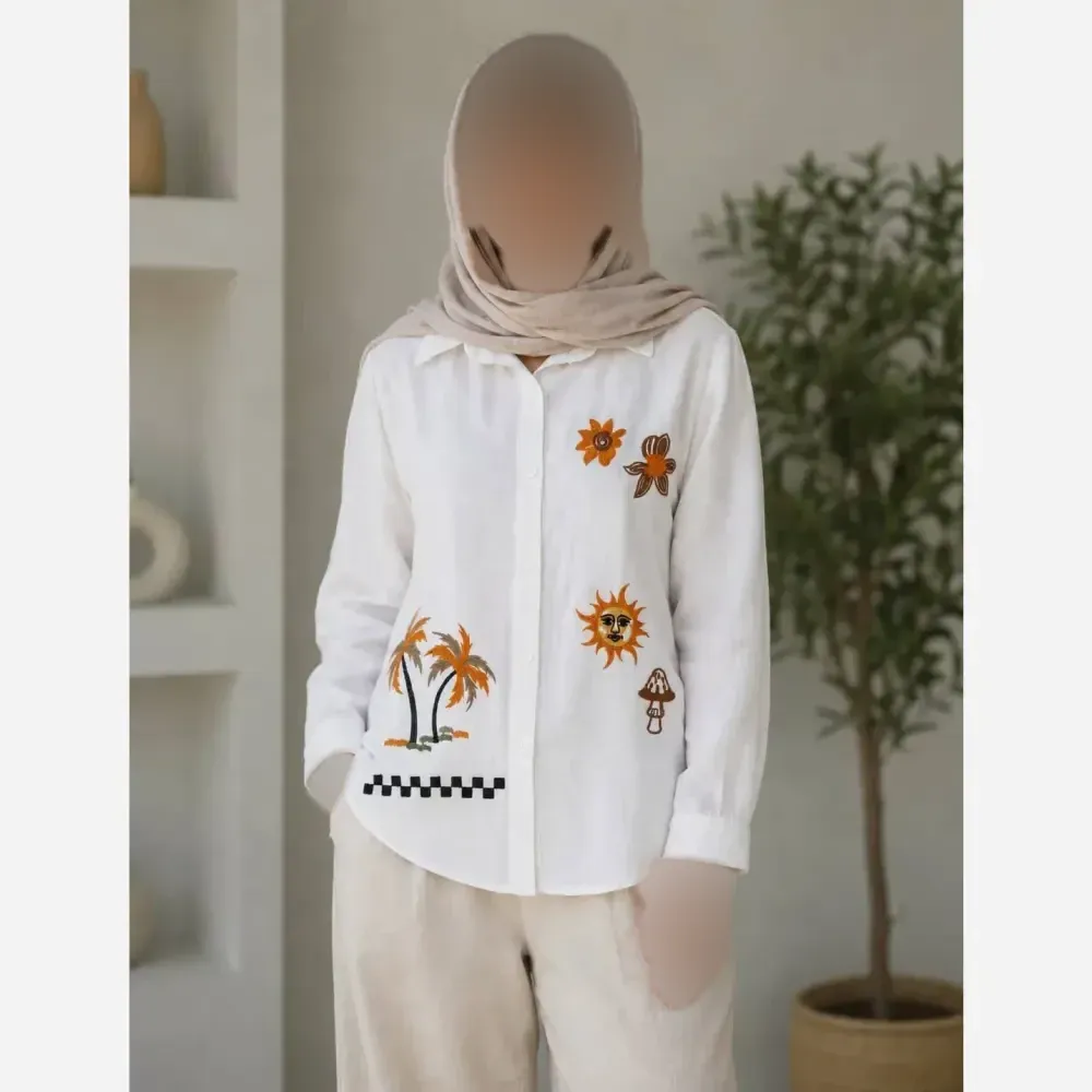 شومیز زنانه طرح نخل و خورشید گلدوزی شده جنس داکرون درجه یک