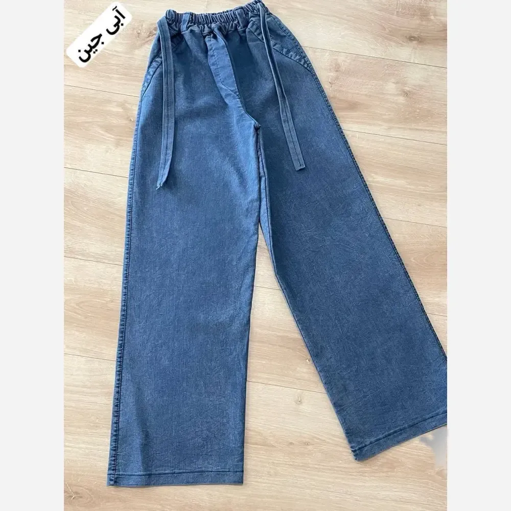 شلوار بگ طرح جین نیل درجه یک کمر کش و کمربند دار رنگ بندی متنوع سایز بزرگ و معمولی قد 100