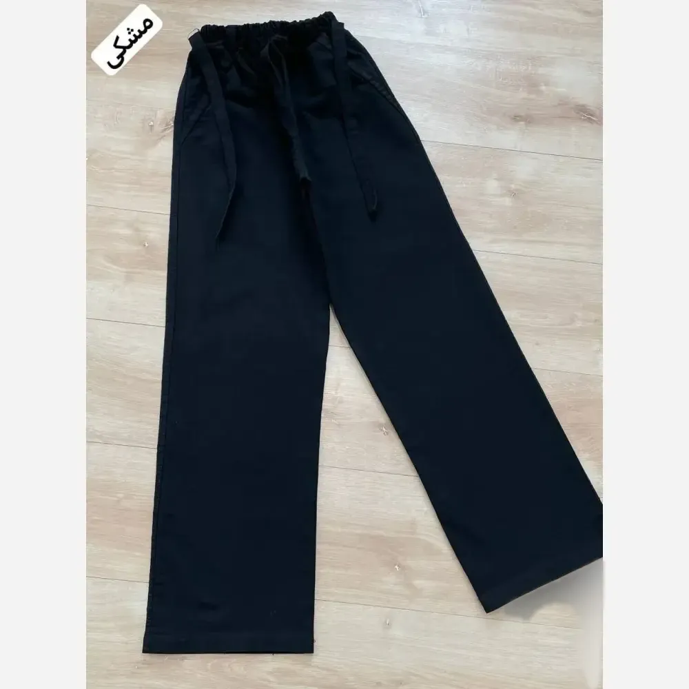 شلوار بگ طرح جین نیل درجه یک کمر کش و کمربند دار رنگ بندی متنوع سایز بزرگ و معمولی قد 100