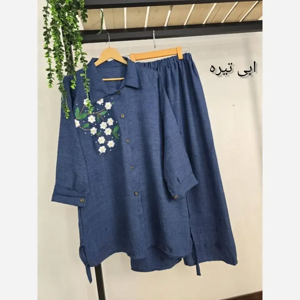 شومیز کمربند دار شکوفه جنس شانتون آبی روشن فری سایز