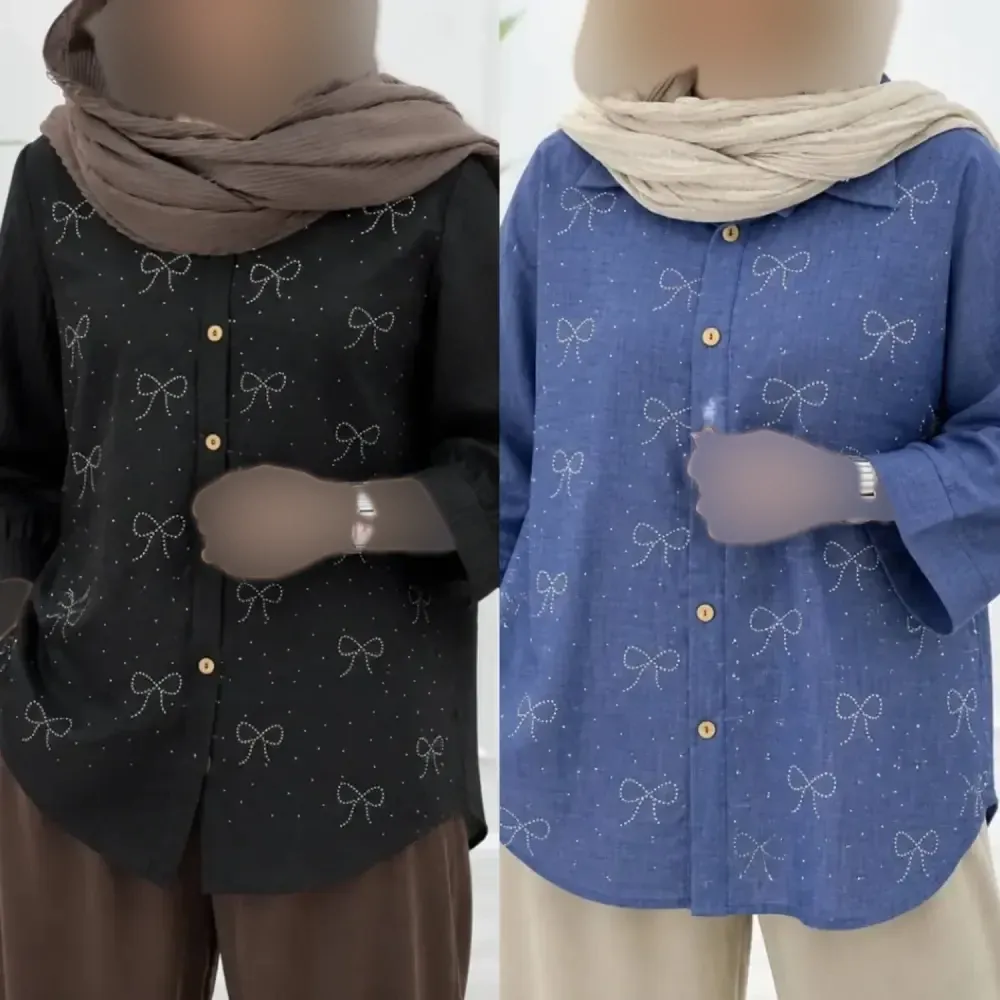 شومیز مانتویی نگین پاپیون شانتون با قد جلو 80 و قد پشت 85 در رنگبندی مشکی، کرم، نسکافه ای، سبز سدری، سرمه ای و طوسی